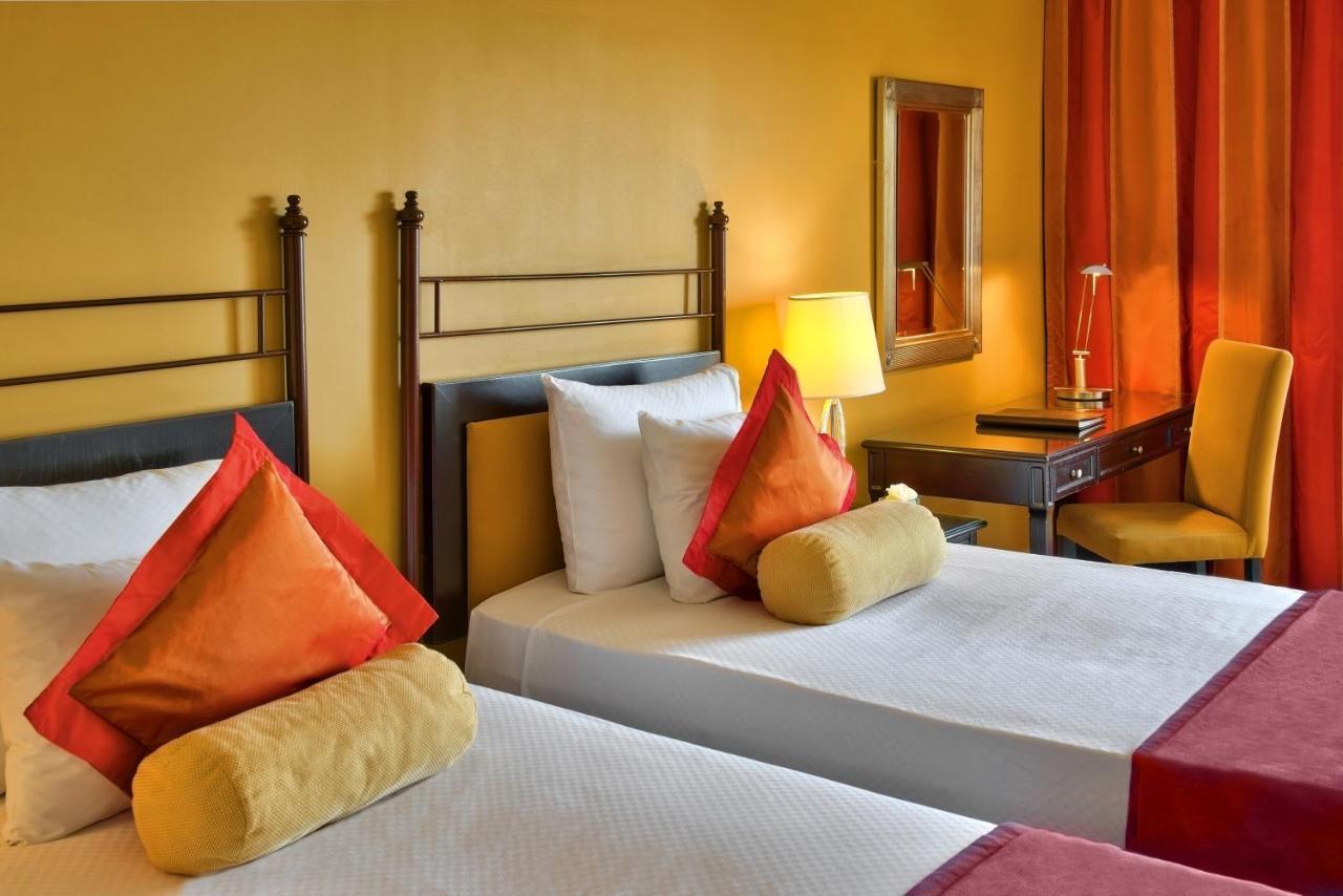 Hotel Corinthia St George'S Bay Saint Julian's Exteriér fotografie A room at the hotel