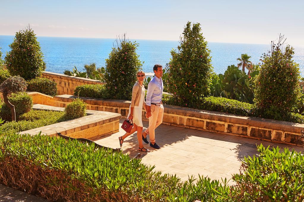 Hotel Corinthia St George'S Bay Saint Julian's Exteriér fotografie The resort's gardens